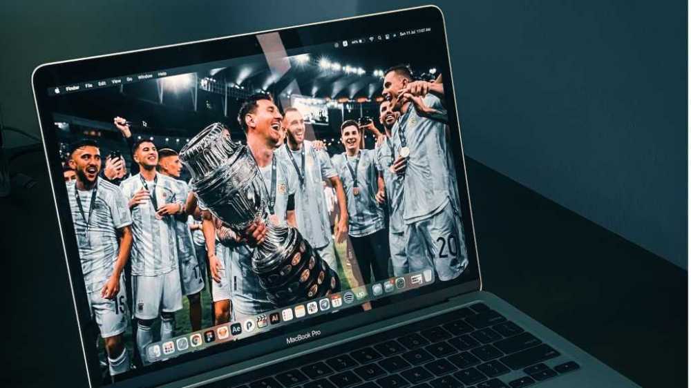 Lionel Messi on a MacBook Pro