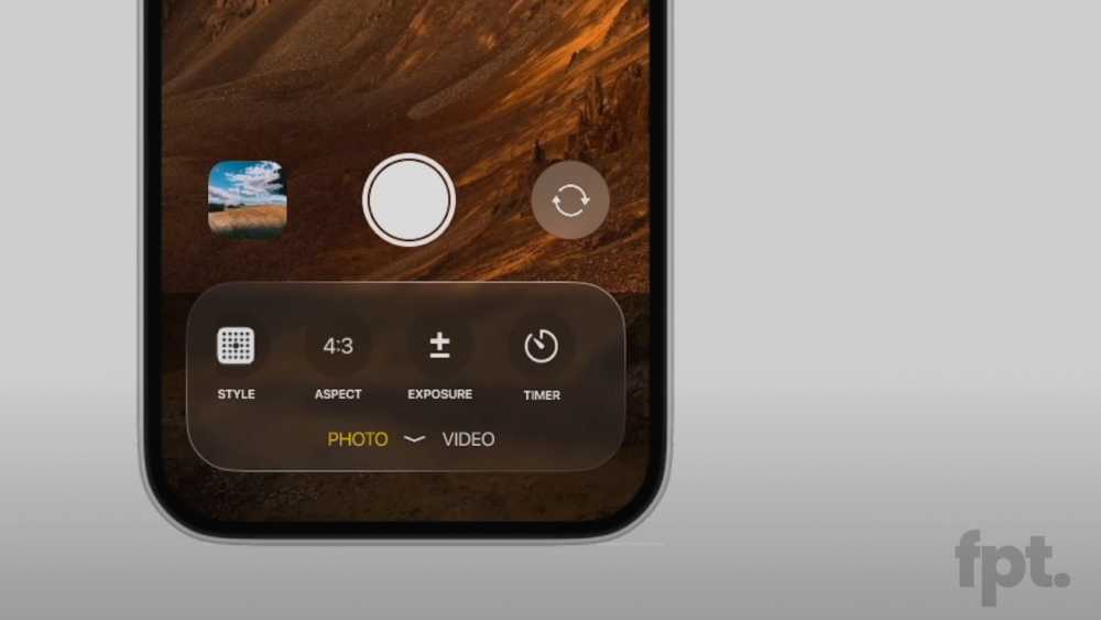 Close-up of a smartphone camera interface showing aspect ratio settings, photo and video mode options, and exposure timer on a screen with a landscape background.