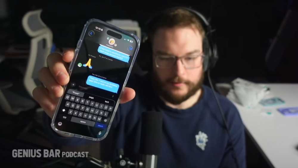 Person wearing headphones holds smartphone with an open messaging app, displaying a conversation. Background includes a microphone and office setting. Text reads 'GENIUS BAR PODCAST'.
