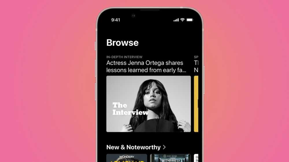Smartphone screen displaying a browsing page with a female celebrity featured in an in-depth interview and a section labeled 'New & Noteworthy.' Background is a gradient pink.