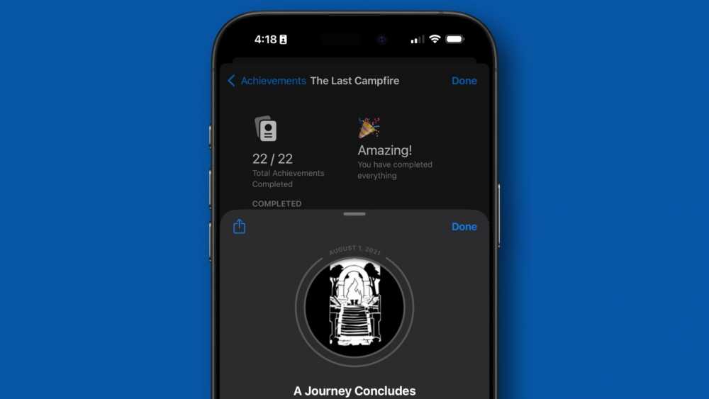 Smartphone screen showing completed achievements for The Last Campfire game, with 22 out of 22 total completed. Text reads 'Amazing!' with celebratory graphics.