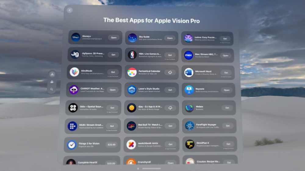 一个数字界面，显示了Apple Vision Pro的应用列表，包括它们的图标和可用状态，背景是沙漠上空多云的天空。