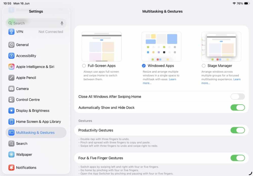 Tablet settings screen displaying multitasking and gestures options, including full-screen, windowed apps, stage manager, and toggle switches for various gesture controls.