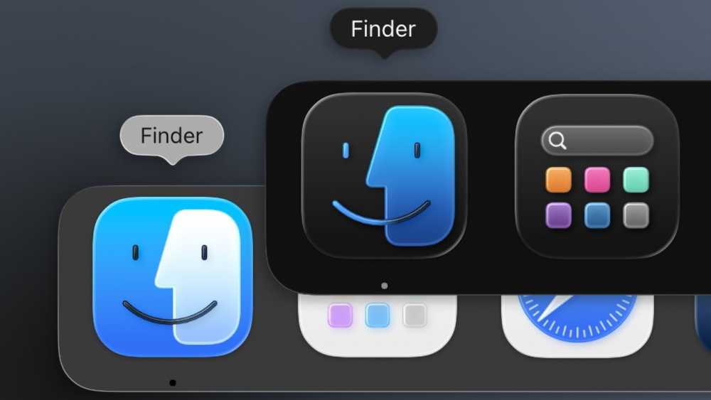 Blue and black Finder application icons with smiley faces, overlapping with an icon featuring a magnifying glass and colorful blocks.