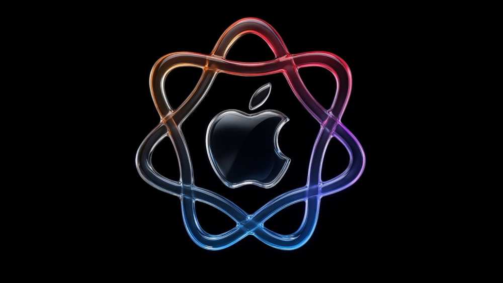 Colorful atomic pattern encircles a metallic apple logo with a black background.