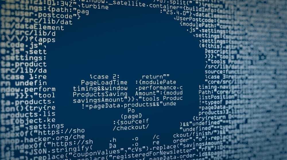 Computer code forms the shape of a skull on a dark blue background.