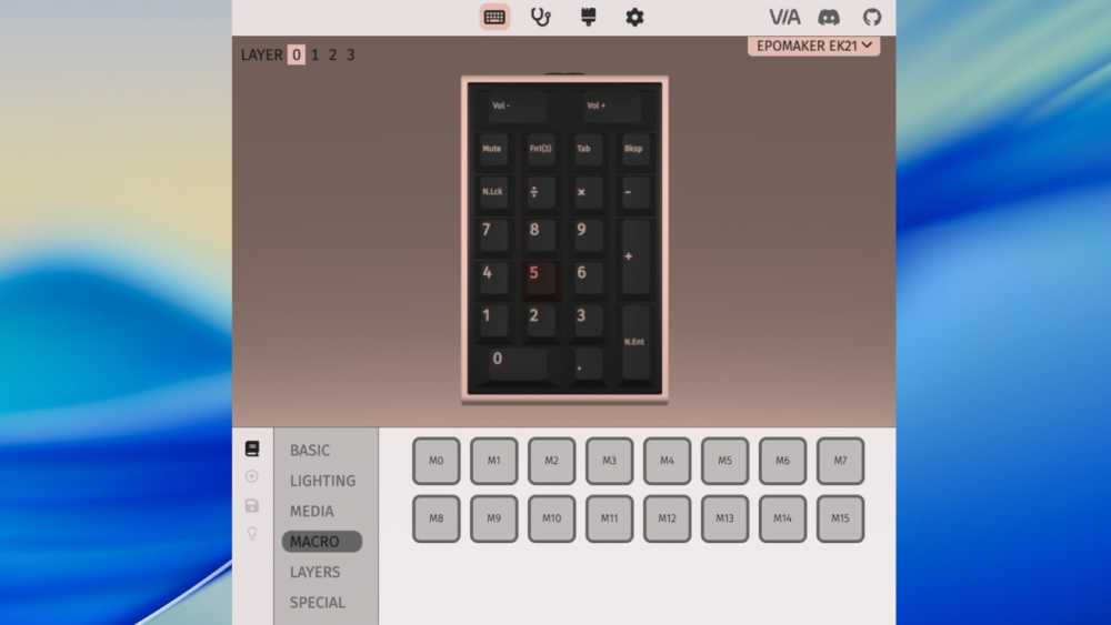 A digital interface displaying a numeric keypad with various function keys and a highlighted number five. There’s options for layers, basic settings, and macro buttons.