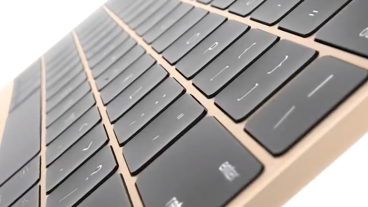 2015款MacBook标志性的蝶式键盘特写